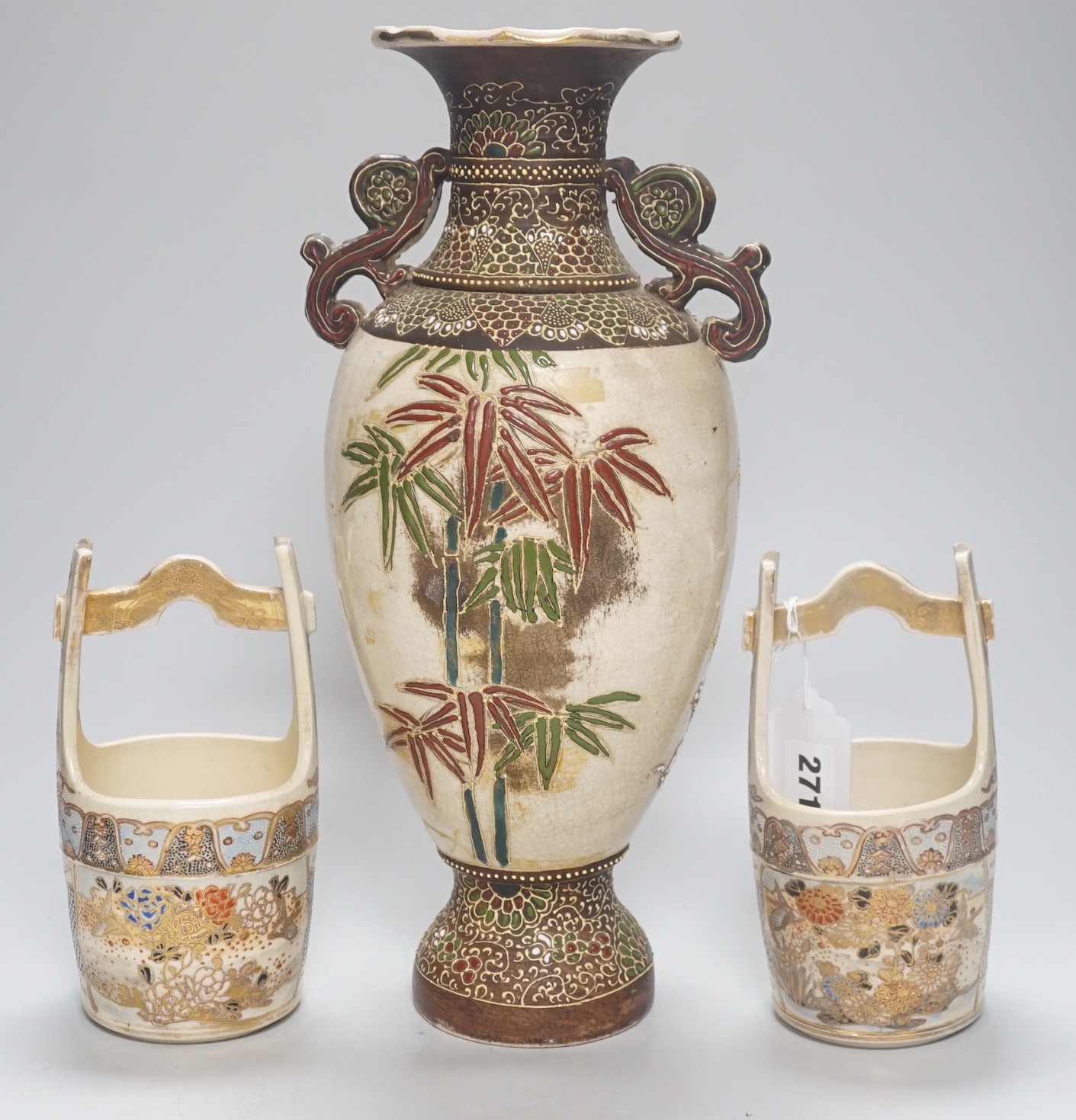 A pair of Japanese Satsuma bucket vases and another vase, 37cm